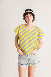 Yellow sleeveless top