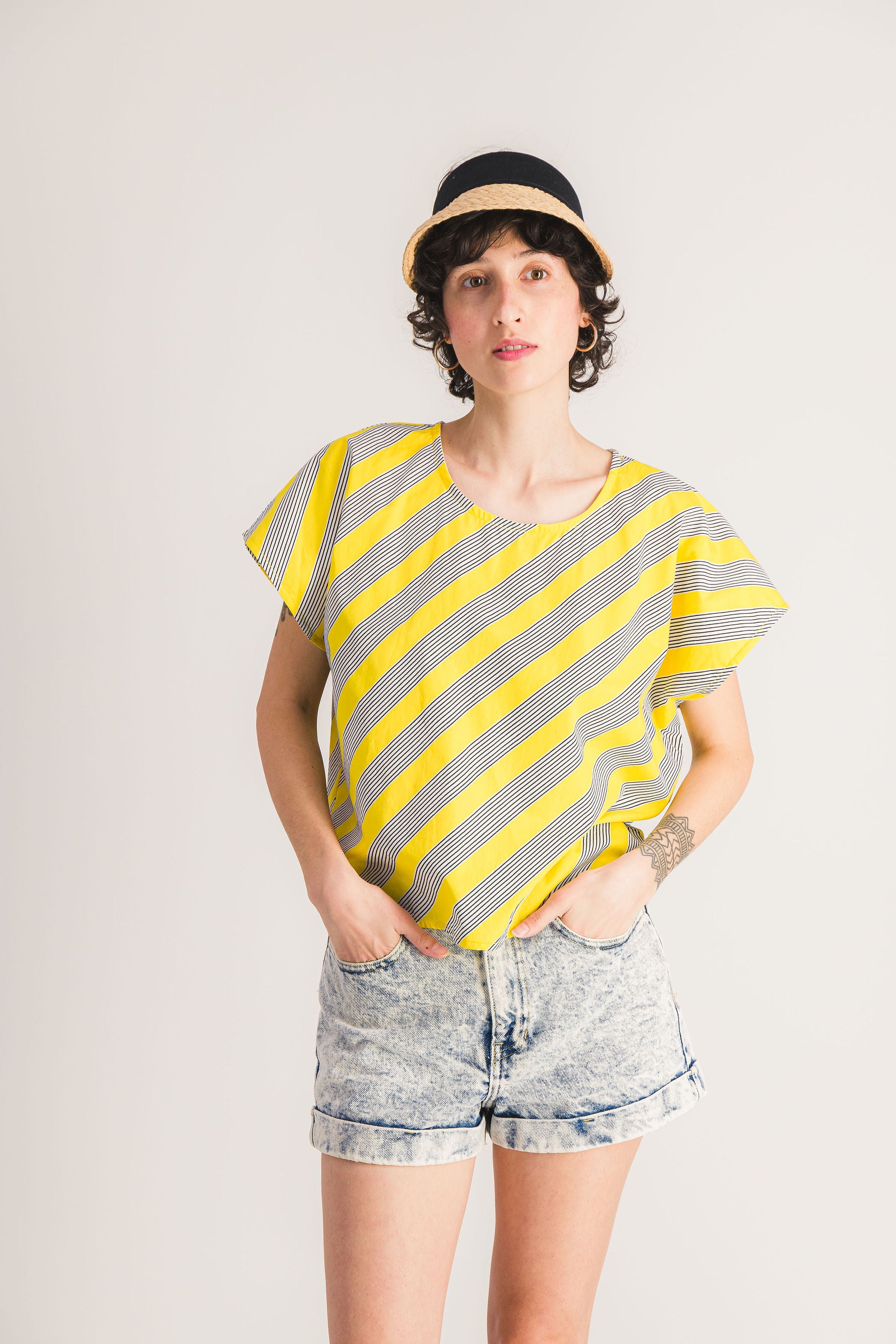 Yellow sleeveless top