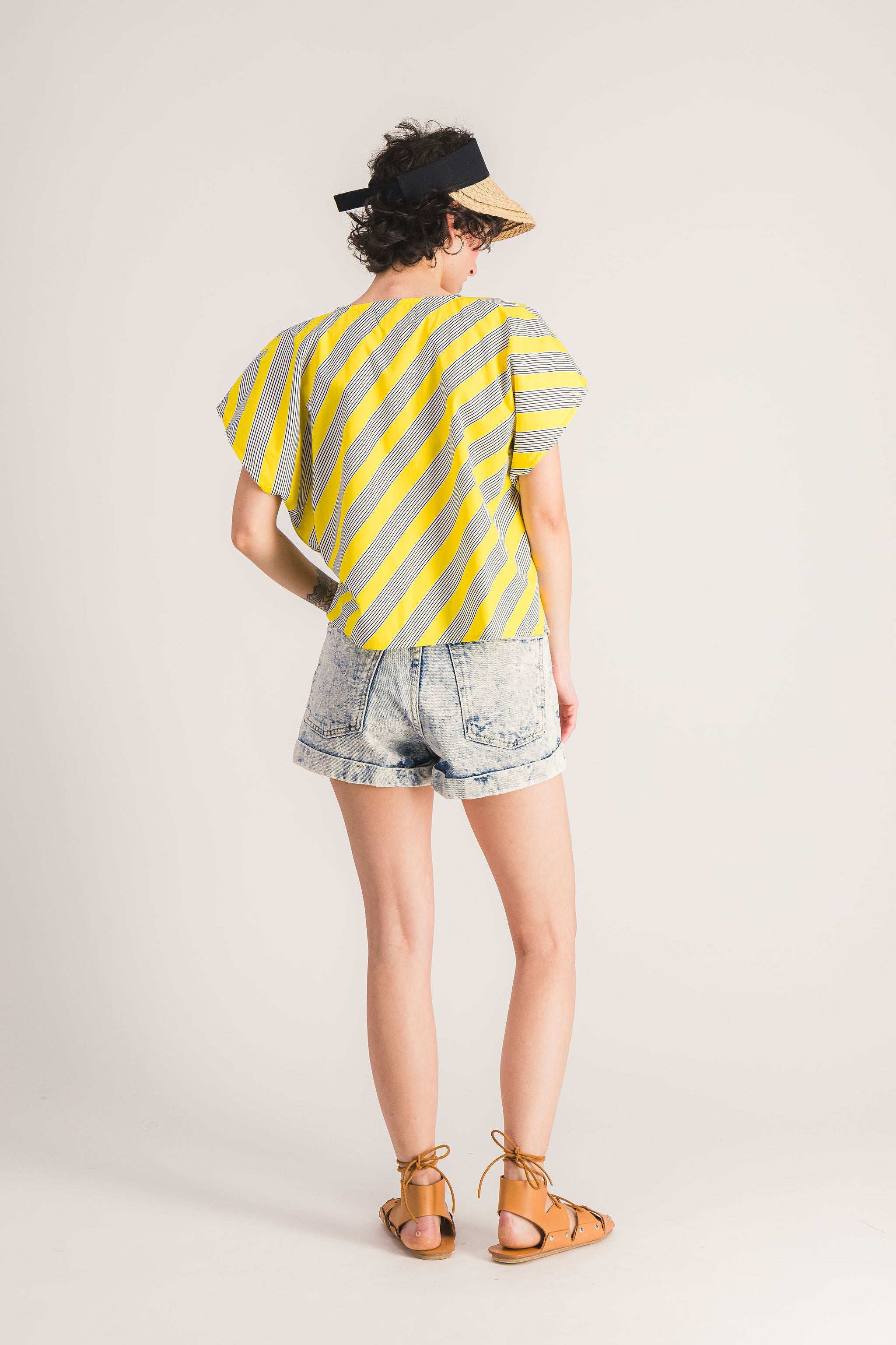 Yellow sleeveless top