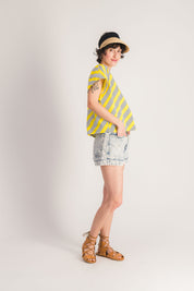 Yellow sleeveless top