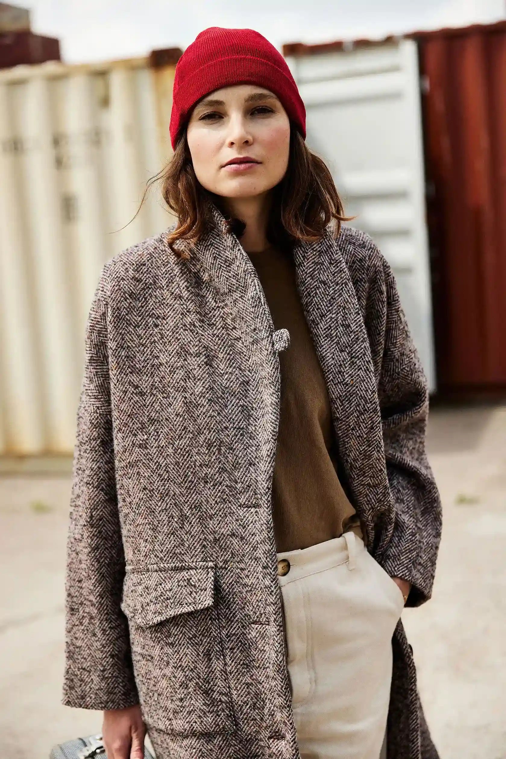 Women's mid-length brown coat with shawl collar